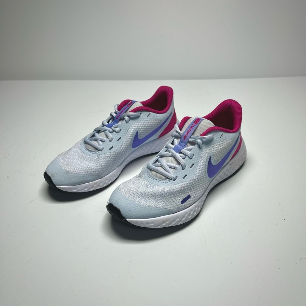 NIKE Revolution Running white Tennis shoe | Size 6 Youth/8 Women’s